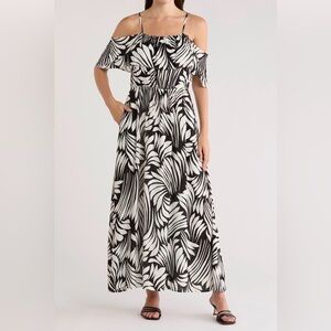 Area Stars Elegant Black and White Off-Shoulder Dress